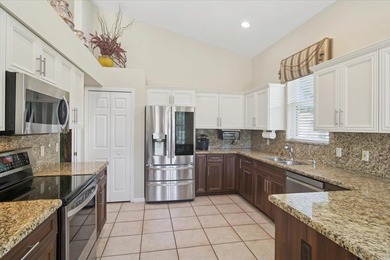 NEW TILE ROOF 2025! Golfer's Paradise in PGA Village - Stunning on The Legacy Golf and Tennis Club in Florida - for sale on GolfHomes.com, golf home, golf lot