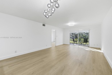 Experience luxury living in this stunning golf-view residence on Flamingo Lakes Country Club in Florida - for sale on GolfHomes.com, golf home, golf lot