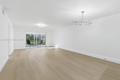 Experience luxury living in this stunning golf-view residence on Flamingo Lakes Country Club in Florida - for sale on GolfHomes.com, golf home, golf lot