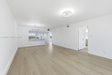 Experience luxury living in this stunning golf-view residence on Flamingo Lakes Country Club in Florida - for sale on GolfHomes.com, golf home, golf lot