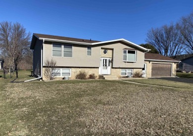 Family home opportunity! 4 Bedroom, 2 Bath split-foyer styled on Oneota Golf and Country Club in Iowa - for sale on GolfHomes.com, golf home, golf lot