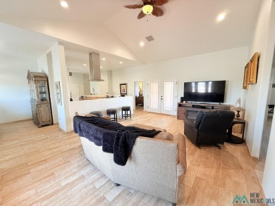 PANORAMIC VIEWS TO ENJOY FROM INDOORS OR THE COVERED PATIO on Sierra Del Rio Golf Club in New Mexico - for sale on GolfHomes.com, golf home, golf lot