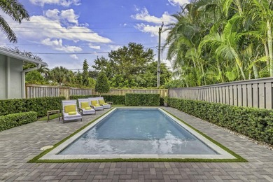 You'll find easy living in this move-in ready Arts and Crafts on Lake Worth Municipal Golf Course in Florida - for sale on GolfHomes.com, golf home, golf lot