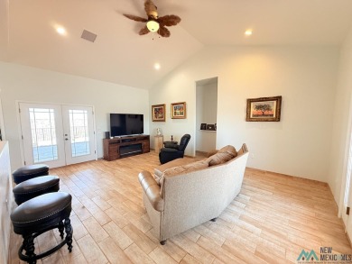 PANORAMIC VIEWS TO ENJOY FROM INDOORS OR THE COVERED PATIO on Sierra Del Rio Golf Club in New Mexico - for sale on GolfHomes.com, golf home, golf lot