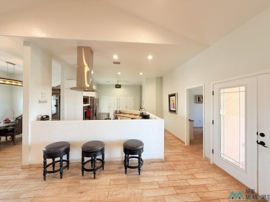 PANORAMIC VIEWS TO ENJOY FROM INDOORS OR THE COVERED PATIO on Sierra Del Rio Golf Club in New Mexico - for sale on GolfHomes.com, golf home, golf lot