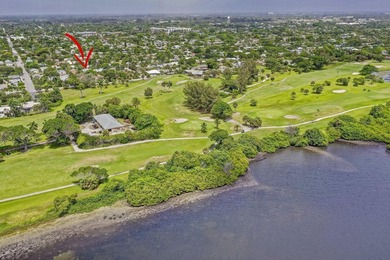 You'll find easy living in this move-in ready Arts and Crafts on Lake Worth Municipal Golf Course in Florida - for sale on GolfHomes.com, golf home, golf lot