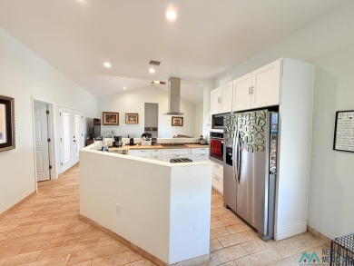 PANORAMIC VIEWS TO ENJOY FROM INDOORS OR THE COVERED PATIO on Sierra Del Rio Golf Club in New Mexico - for sale on GolfHomes.com, golf home, golf lot