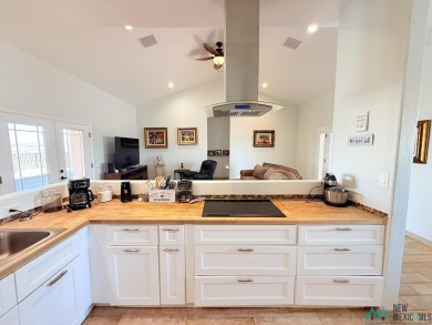 PANORAMIC VIEWS TO ENJOY FROM INDOORS OR THE COVERED PATIO on Sierra Del Rio Golf Club in New Mexico - for sale on GolfHomes.com, golf home, golf lot