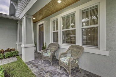 You'll find easy living in this move-in ready Arts and Crafts on Lake Worth Municipal Golf Course in Florida - for sale on GolfHomes.com, golf home, golf lot