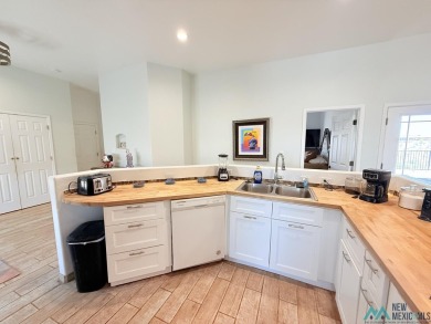 PANORAMIC VIEWS TO ENJOY FROM INDOORS OR THE COVERED PATIO on Sierra Del Rio Golf Club in New Mexico - for sale on GolfHomes.com, golf home, golf lot