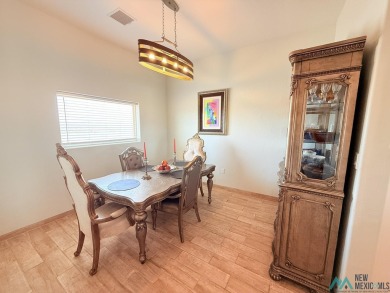 PANORAMIC VIEWS TO ENJOY FROM INDOORS OR THE COVERED PATIO on Sierra Del Rio Golf Club in New Mexico - for sale on GolfHomes.com, golf home, golf lot