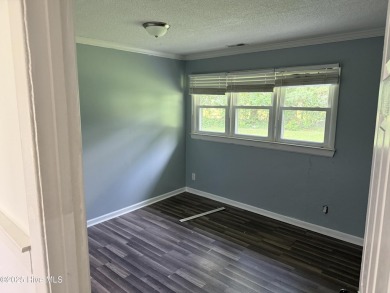 1400 square feet, 3 bed, 2 full bath brick home on Goldsboro on Goldsboro Municipal Golf Course in North Carolina - for sale on GolfHomes.com, golf home, golf lot