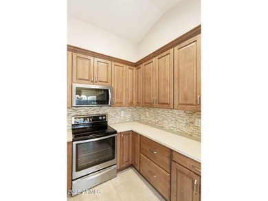 Welcome home to this beautifully remodeled Extended Carmel model on SunBird Golf Club in Arizona - for sale on GolfHomes.com, golf home, golf lot