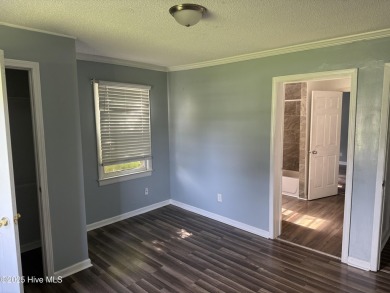 1400 square feet, 3 bed, 2 full bath brick home on Goldsboro on Goldsboro Municipal Golf Course in North Carolina - for sale on GolfHomes.com, golf home, golf lot