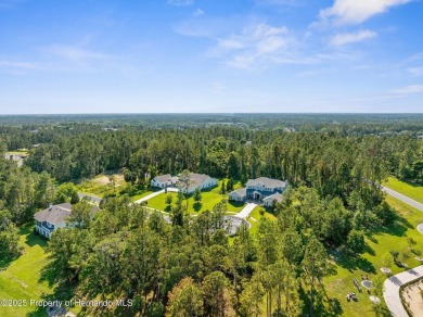 Perched high, on a serene cul-de-sac in the most prestigious on Southern Hills Plantation Club in Florida - for sale on GolfHomes.com, golf home, golf lot