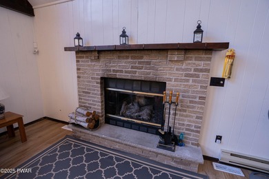 Meticulously maintained and beautifully updated chalet in the on The Hideout Golf in Pennsylvania - for sale on GolfHomes.com, golf home, golf lot