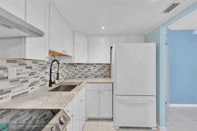 55+ COMMUNITY, THIS TURN KEY READY UNIT IS ON THE 1st FLOOR on Sunrise Lakes Phase III in Florida - for sale on GolfHomes.com, golf home, golf lot