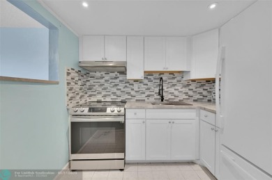 55+ COMMUNITY, THIS TURN KEY READY UNIT IS ON THE 1st FLOOR on Sunrise Lakes Phase III in Florida - for sale on GolfHomes.com, golf home, golf lot