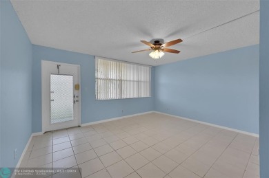55+ COMMUNITY, THIS TURN KEY READY UNIT IS ON THE 1st FLOOR on Sunrise Lakes Phase III in Florida - for sale on GolfHomes.com, golf home, golf lot