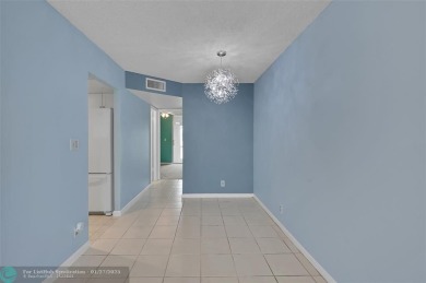 55+ COMMUNITY, THIS TURN KEY READY UNIT IS ON THE 1st FLOOR on Sunrise Lakes Phase III in Florida - for sale on GolfHomes.com, golf home, golf lot