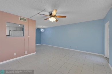 55+ COMMUNITY, THIS TURN KEY READY UNIT IS ON THE 1st FLOOR on Sunrise Lakes Phase III in Florida - for sale on GolfHomes.com, golf home, golf lot