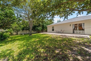 Lovely home in Southwest Cape Coral. Oversized, corner lot with on Royal Tee Country Club in Florida - for sale on GolfHomes.com, golf home, golf lot