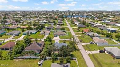 Lovely home in Southwest Cape Coral. Oversized, corner lot with on Royal Tee Country Club in Florida - for sale on GolfHomes.com, golf home, golf lot
