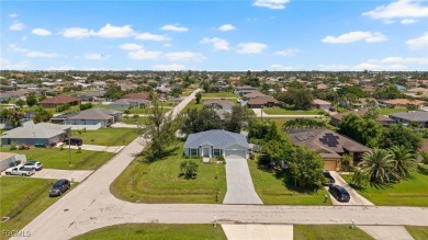 Lovely home in Southwest Cape Coral. Oversized, corner lot with on Royal Tee Country Club in Florida - for sale on GolfHomes.com, golf home, golf lot