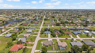 Lovely home in Southwest Cape Coral. Oversized, corner lot with on Royal Tee Country Club in Florida - for sale on GolfHomes.com, golf home, golf lot