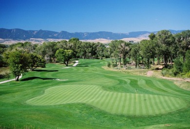 Build your dream home on this stunning golf course lot in The on The Powder Horn Golf Club - Mountain in Wyoming - for sale on GolfHomes.com, golf home, golf lot