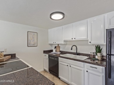 Lovely 2-story townhome with 2 bedrooms, 1.5 baths.  Kitchen on Raven Golf Club At South Mountain in Arizona - for sale on GolfHomes.com, golf home, golf lot