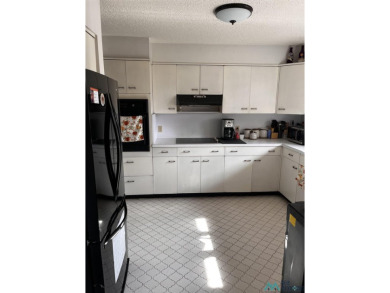 Welcome to this charming 2 bedroom, 2.5 bath brick condo on Chaparral Country Club in New Mexico - for sale on GolfHomes.com, golf home, golf lot