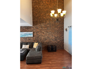 Welcome to this charming 2 bedroom, 2.5 bath brick condo on Chaparral Country Club in New Mexico - for sale on GolfHomes.com, golf home, golf lot