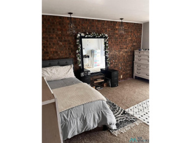 Welcome to this charming 2 bedroom, 2.5 bath brick condo on Chaparral Country Club in New Mexico - for sale on GolfHomes.com, golf home, golf lot