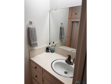 Welcome to this charming 2 bedroom, 2.5 bath brick condo on Chaparral Country Club in New Mexico - for sale on GolfHomes.com, golf home, golf lot