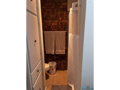 Welcome to this charming 2 bedroom, 2.5 bath brick condo on Chaparral Country Club in New Mexico - for sale on GolfHomes.com, golf home, golf lot