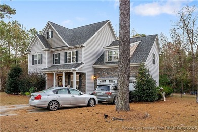 Stunning 4-bedroom, 3-bath home in a quiet cul-de-sac within the on Anderson Creek Golf Club in North Carolina - for sale on GolfHomes.com, golf home, golf lot
