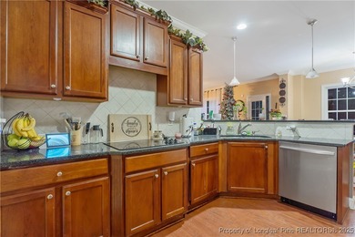 Stunning 4-bedroom, 3-bath home in a quiet cul-de-sac within the on Anderson Creek Golf Club in North Carolina - for sale on GolfHomes.com, golf home, golf lot