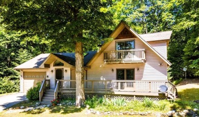 Enjoy Northern Michigan living in this spacious Chalet style on Schuss Mountain Golf Club in Michigan - for sale on GolfHomes.com, golf home, golf lot