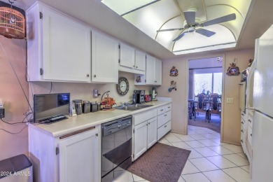 This Sun City home is delightful! Its spacious layout and large on PalmBrook Country Club in Arizona - for sale on GolfHomes.com, golf home, golf lot