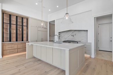 Less than a mile from the beach, this breathtaking new on Regatta Bay Golf and Country Club in Florida - for sale on GolfHomes.com, golf home, golf lot