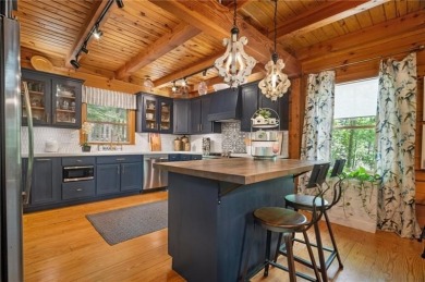 Desiring the wow factor? This mountain chalet nestled in the on Bent Tree Golf Course in Georgia - for sale on GolfHomes.com, golf home, golf lot
