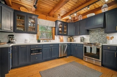 Desiring the wow factor? This mountain chalet nestled in the on Bent Tree Golf Course in Georgia - for sale on GolfHomes.com, golf home, golf lot