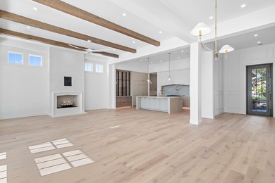 Less than a mile from the beach, this breathtaking new on Regatta Bay Golf and Country Club in Florida - for sale on GolfHomes.com, golf home, golf lot