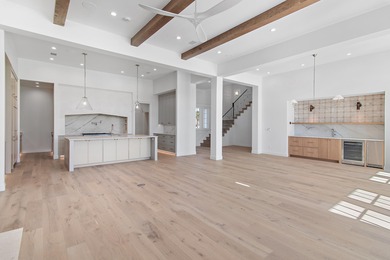 Less than a mile from the beach, this breathtaking new on Regatta Bay Golf and Country Club in Florida - for sale on GolfHomes.com, golf home, golf lot