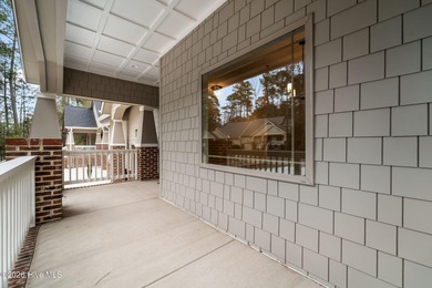 Experience resort-style living in Pinehurst in this on Pinehurst  No. 6 Golf Course in North Carolina - for sale on GolfHomes.com, golf home, golf lot