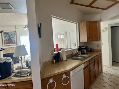 What a find-a two-bedroom, two-bath home with a two-car garage on The Lakes at Ahwatukee in Arizona - for sale on GolfHomes.com, golf home, golf lot