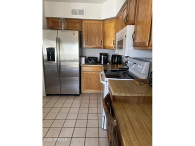 What a find-a two-bedroom, two-bath home with a two-car garage on The Lakes at Ahwatukee in Arizona - for sale on GolfHomes.com, golf home, golf lot