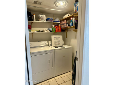 What a find-a two-bedroom, two-bath home with a two-car garage on The Lakes at Ahwatukee in Arizona - for sale on GolfHomes.com, golf home, golf lot