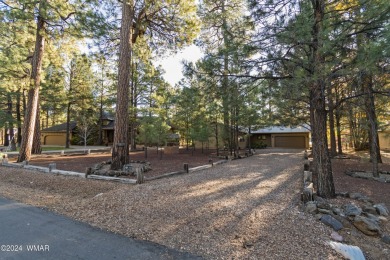 Nestled in the heart of the Pinetop Lakes Country Club, this on Pinetop Lakes Golf and Country Club in Arizona - for sale on GolfHomes.com, golf home, golf lot